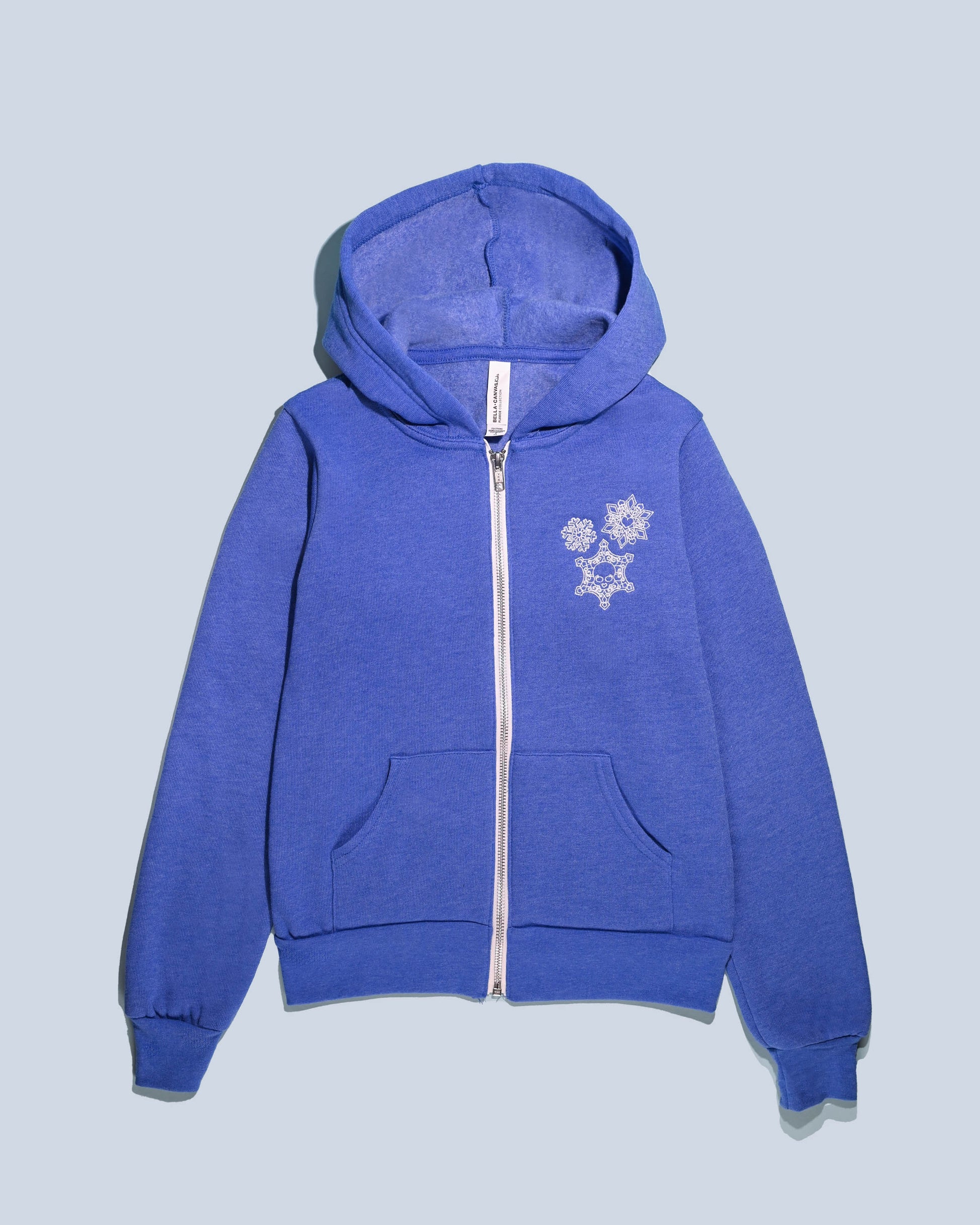 Blue full zip hoodie with embroidered snowflake skull design for girls by HappyDonutClothing.